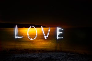 written with light the word Love